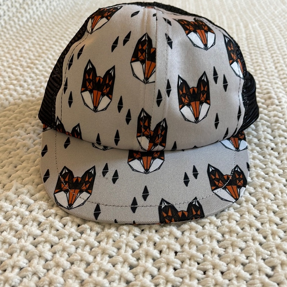 Gently used toddler trucker style hat.